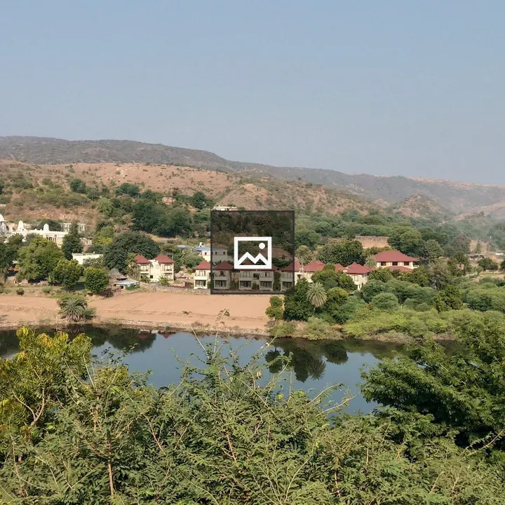 View Across Countryside with Pond