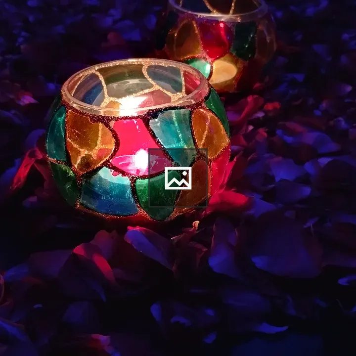 Candle light glass on table