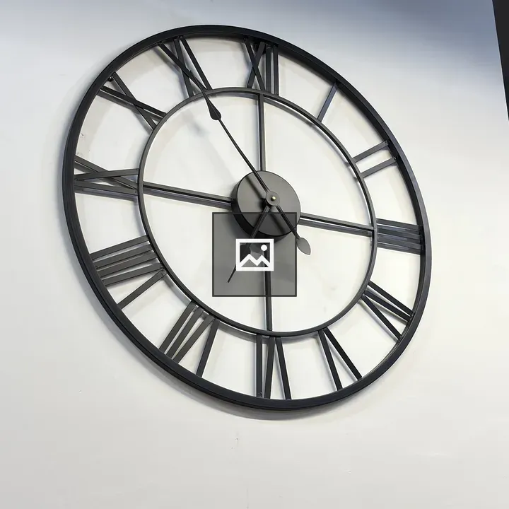 Minimalist wall clock on white wall