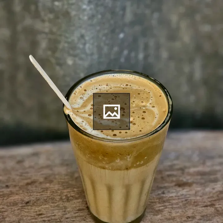 Cappuccino in tea glass
