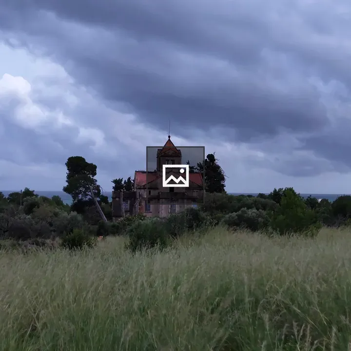 Ruined House in Stormy Landscape