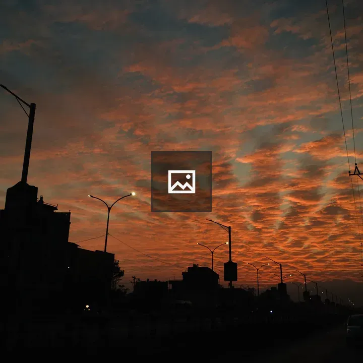 Sunset over urban silhouette