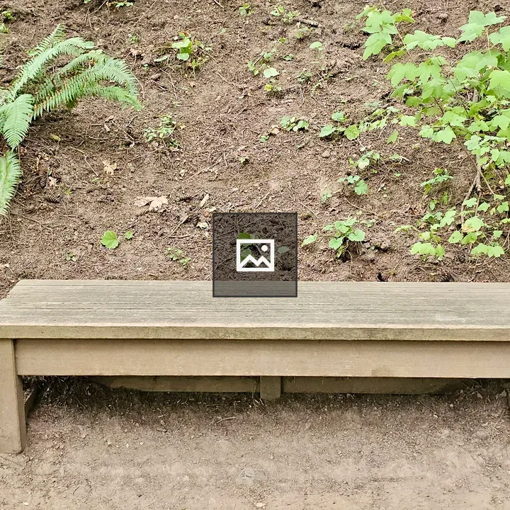 Wooden bench on garden trail