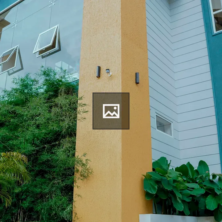 Yellow pillar in blue-green scene