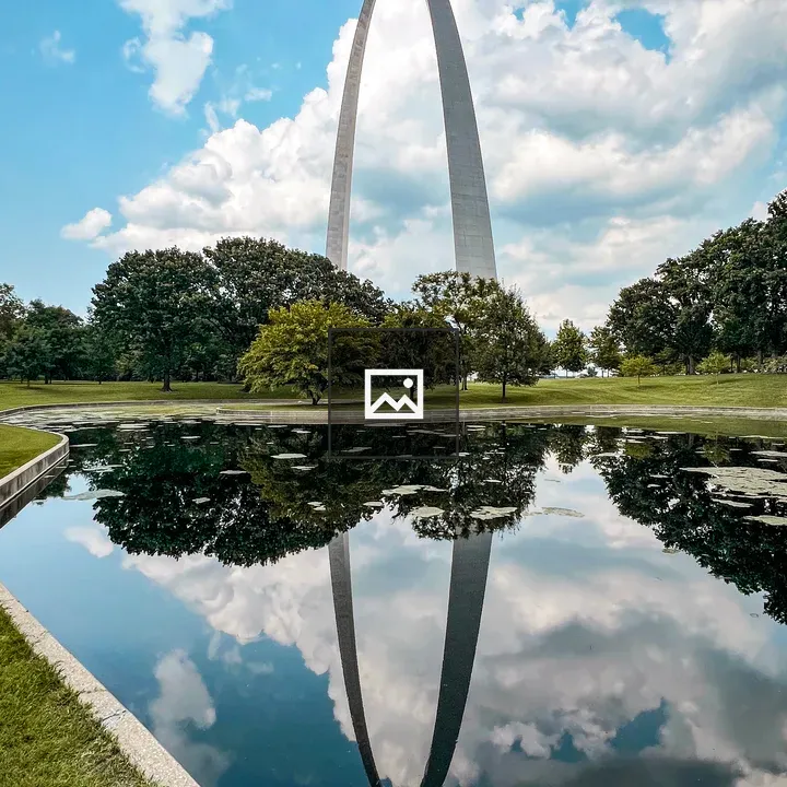 Pond Reflects Gateway Arch