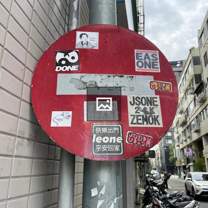 Stop Sign with Stickers in Taipei