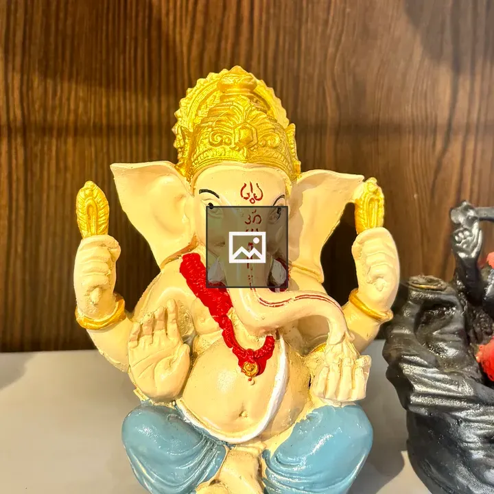 Ganesh statue on table