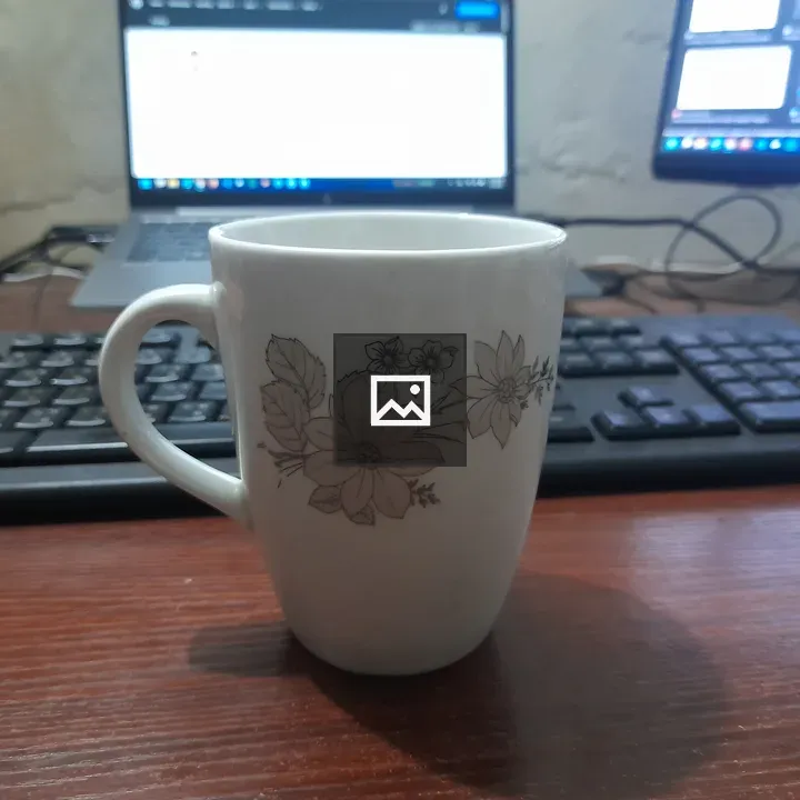 White Coffee Cup on Table
