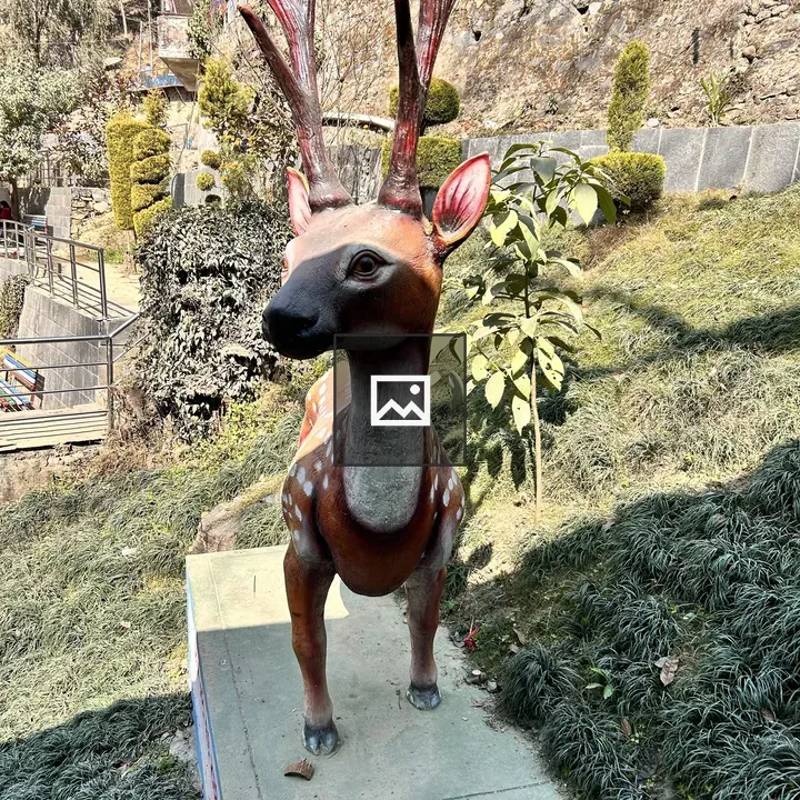 Scripture of deer statue in hill park