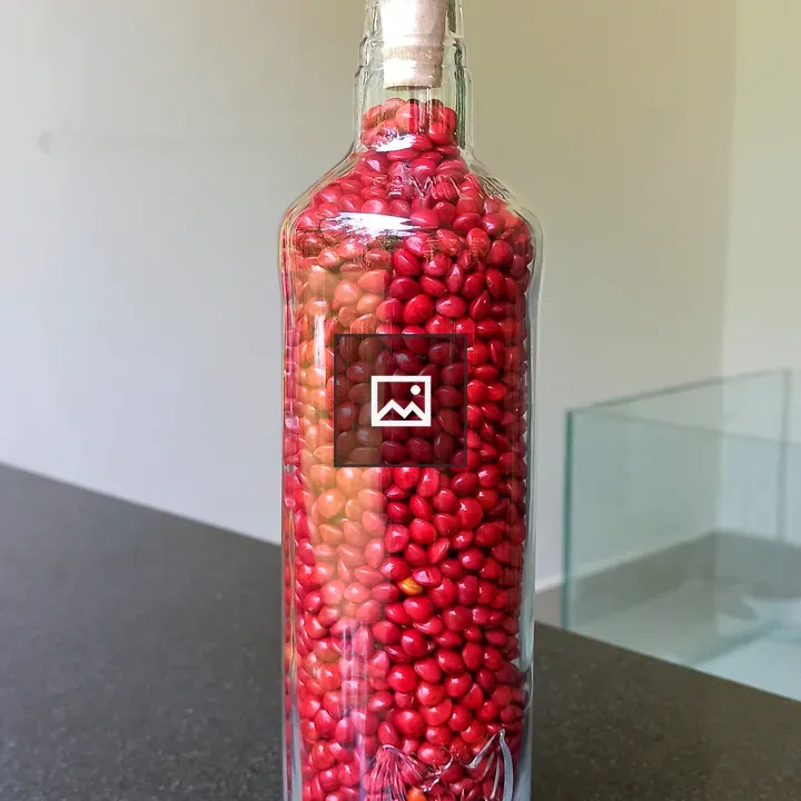 Manjadi seeds in bottle