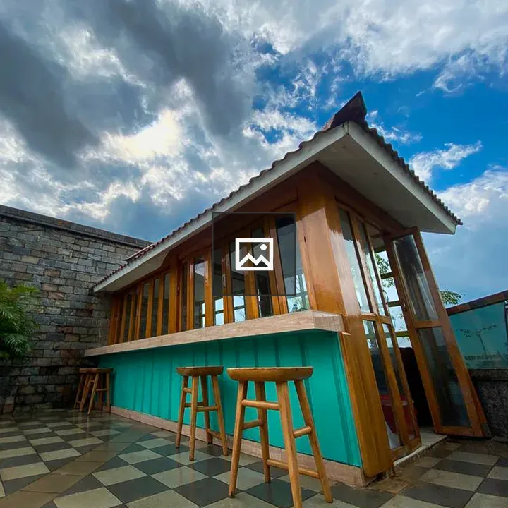Modern Structure with Turquoise Accent