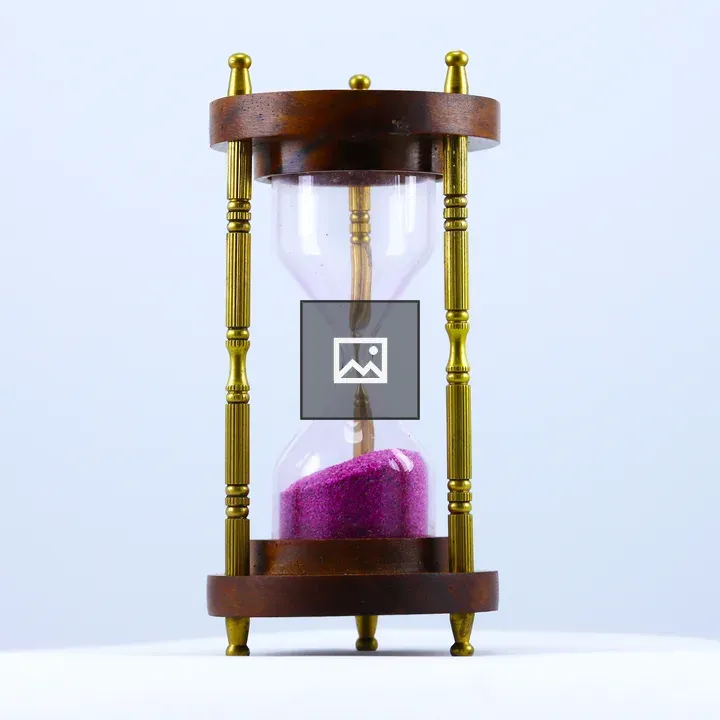 Hourglass with wooden and gold frame