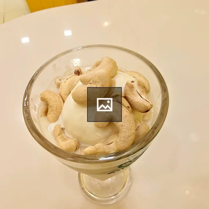 Vanilla ice cream in glass bowl