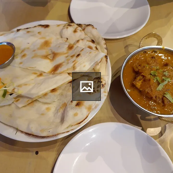Indian meal with naan and curry