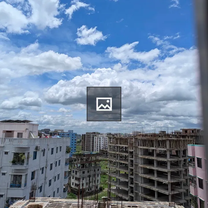 Apartment Buildings Under Cloudy Sky