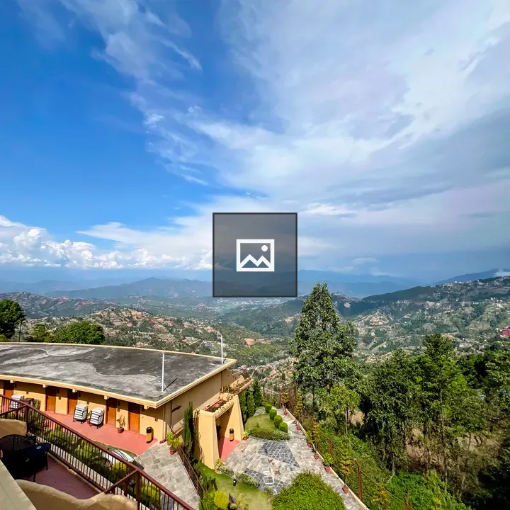 Building overlooking green valley