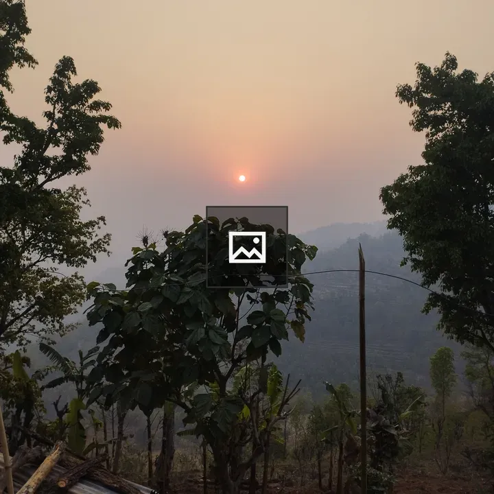 Sunset landscape with distant hills