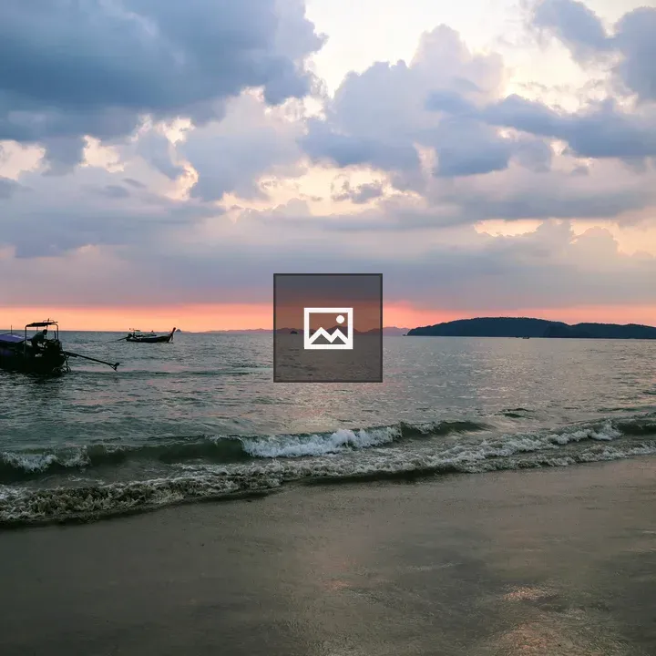 Boat on a Sunset Beach
