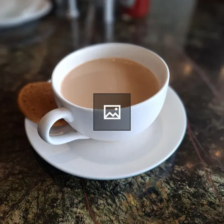Mug of African Tea with Cookie
