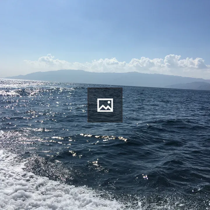 Ocean seascape with waves and mountains