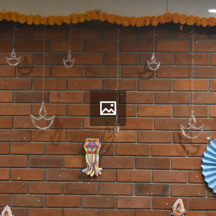 Brick Wall with Hanging Ornaments