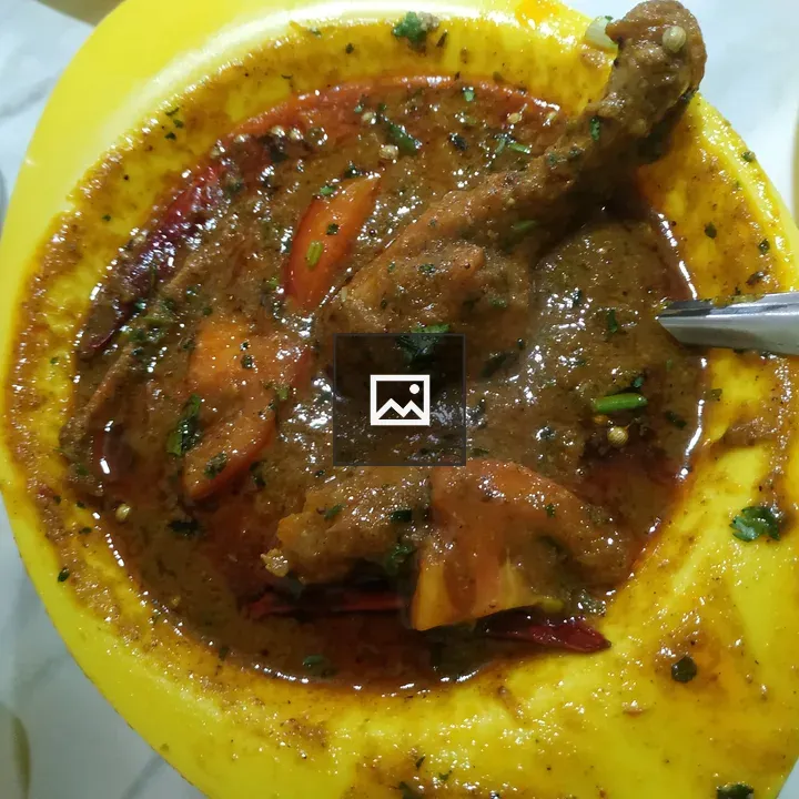 Chicken Handi in Yellow Bowl