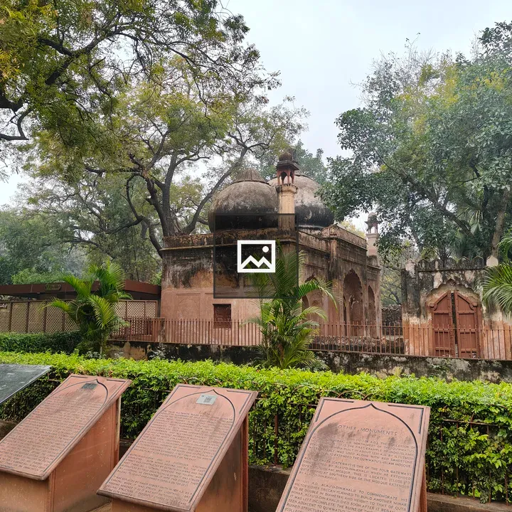 Historical domed structure with greenery