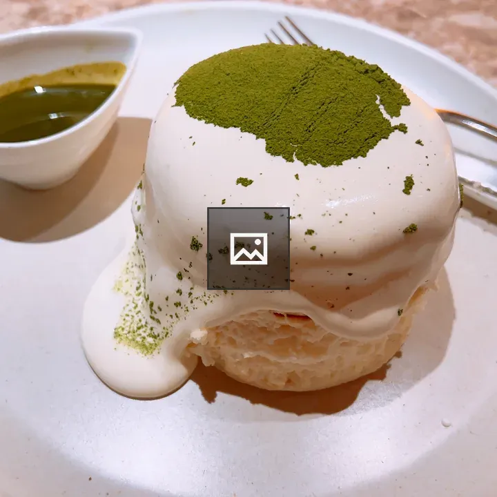 Round matcha tiramisu on plate