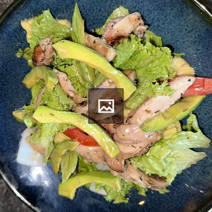 Salad with Grilled Chicken on Blue Plate