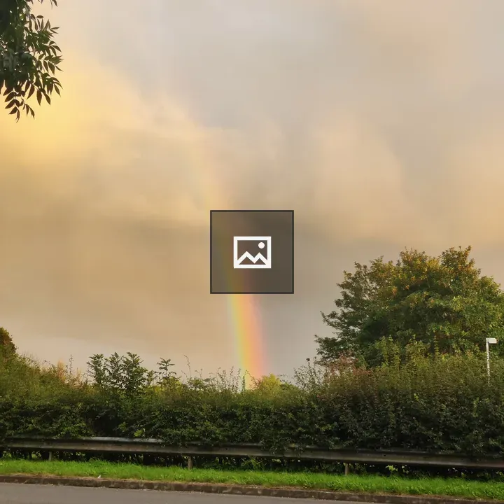 Rainbow Over Road Scene