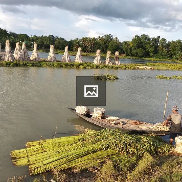 Farmer in river scene