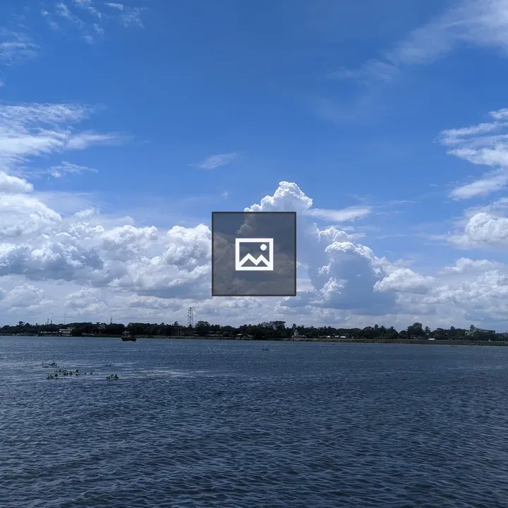 River Scene Under Blue Sky