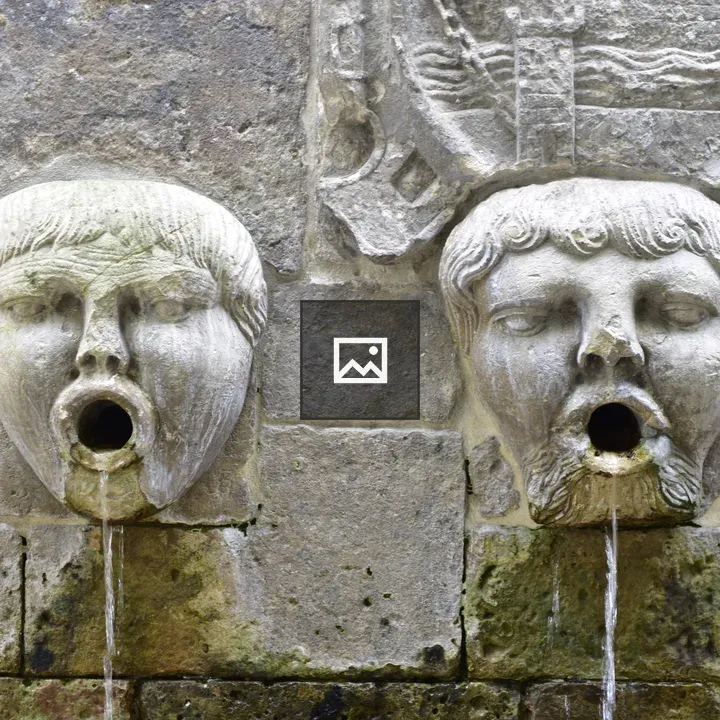 Sculpture heads fountain in Avilés
