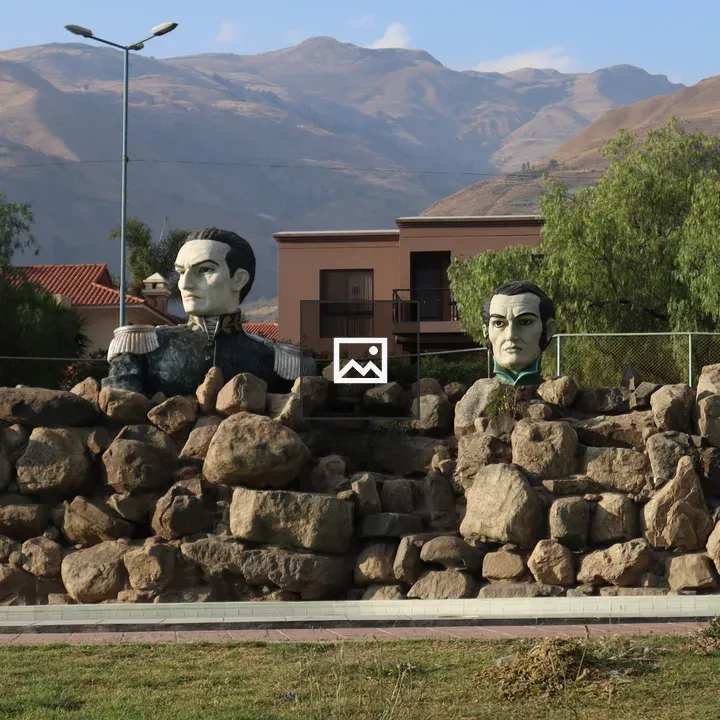 Two historical sculptures with rocks