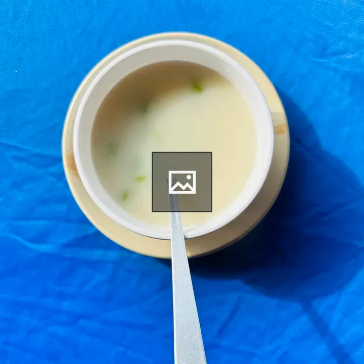 Mushroom soup in blue dishware