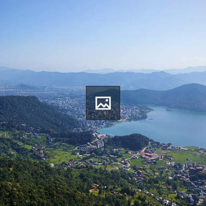 Lush hillside landscape with lake