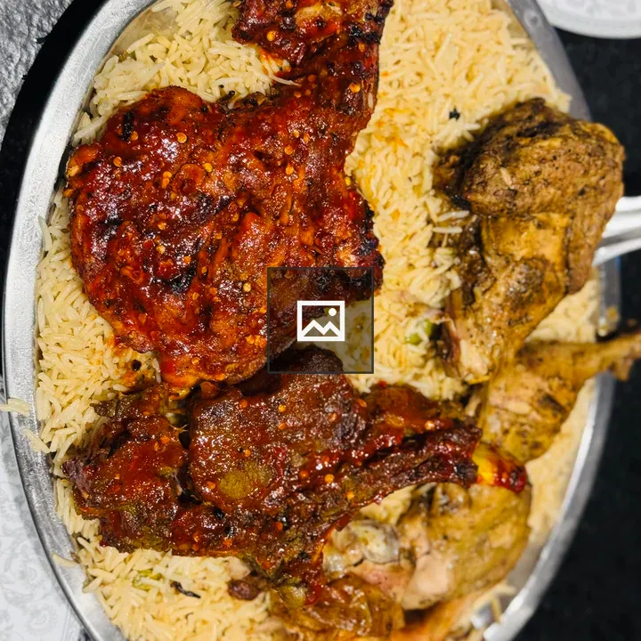 Yellow rice with grilled chicken