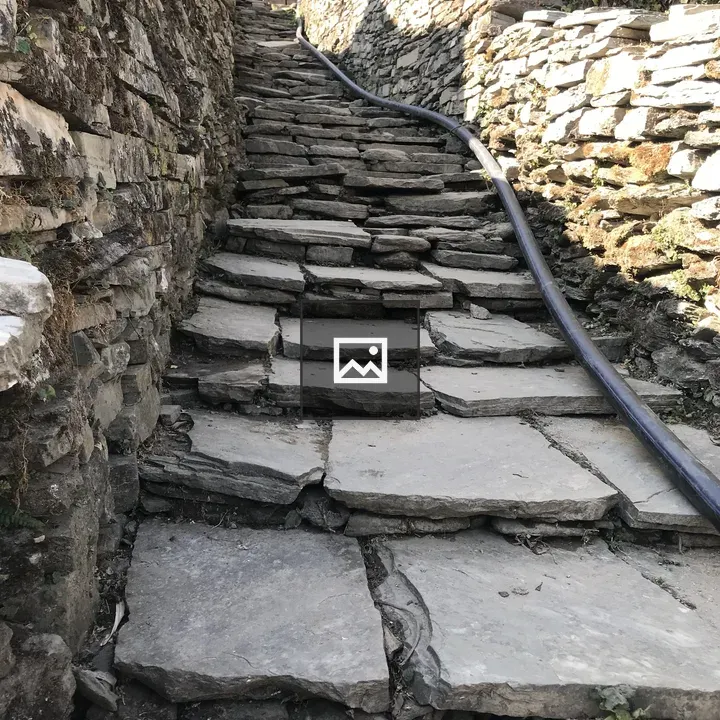 Hose on stone staircase