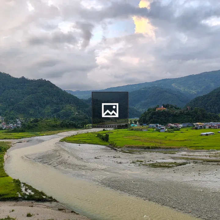 Winding river through lush fields