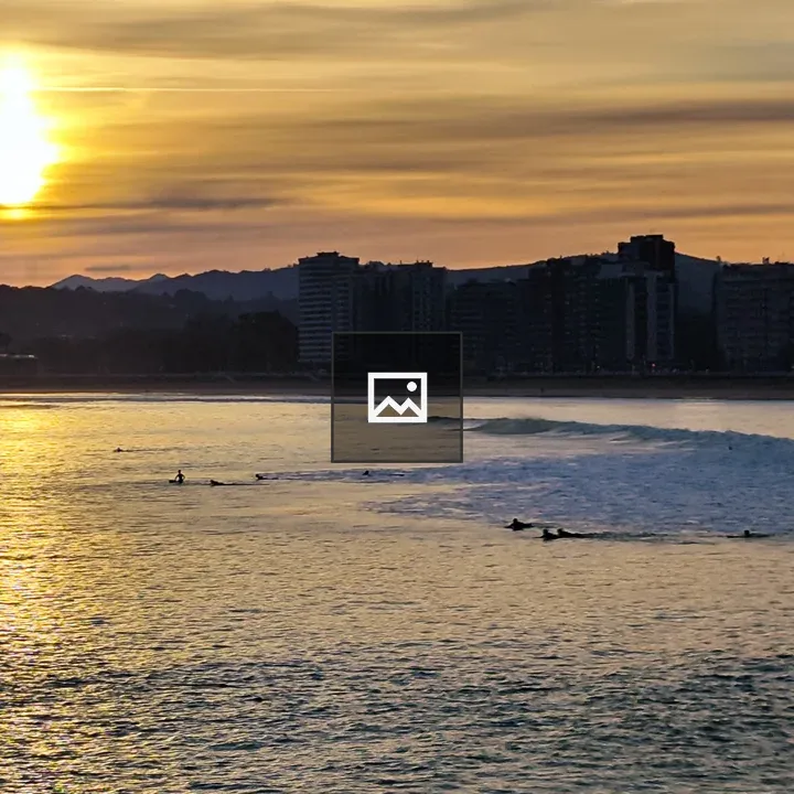Sunset at San Lorenzo Beach with Surfers