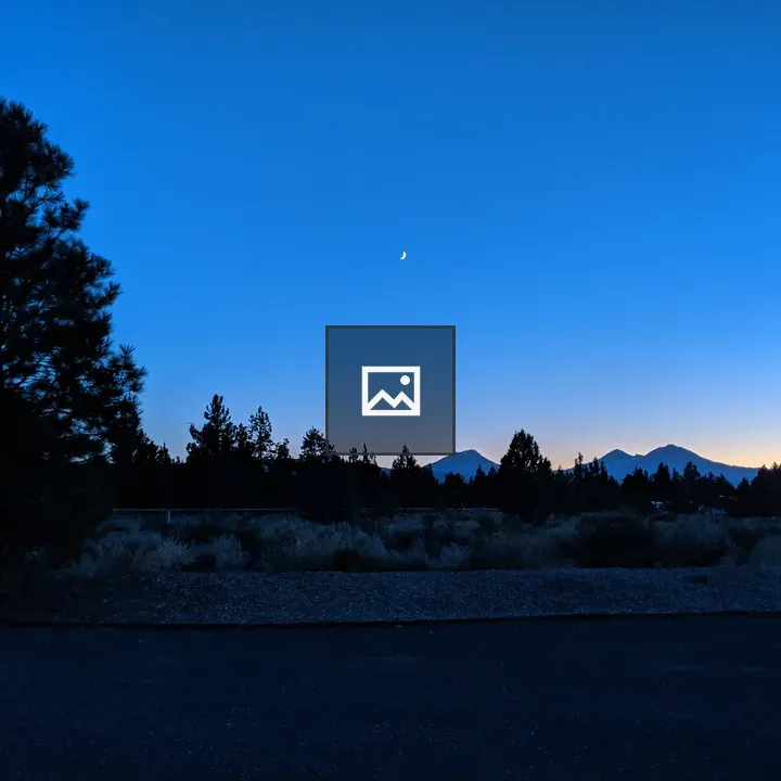 Crescent Moon Over Pines and Mountains