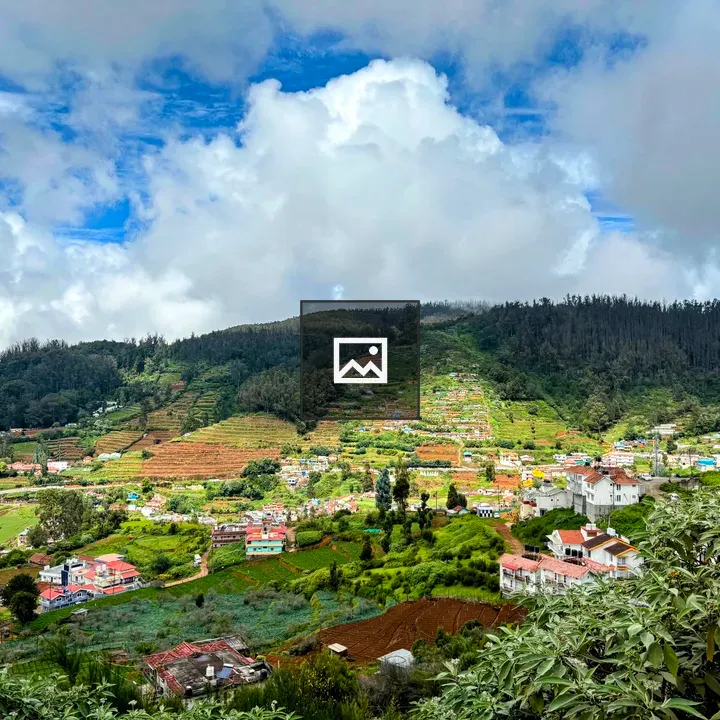 Village in a Blue Sky