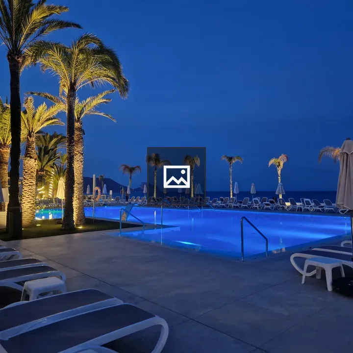 Seaside Resort Pool at Dusk