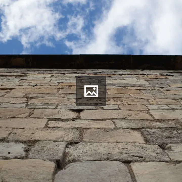 Old wall with blue sky