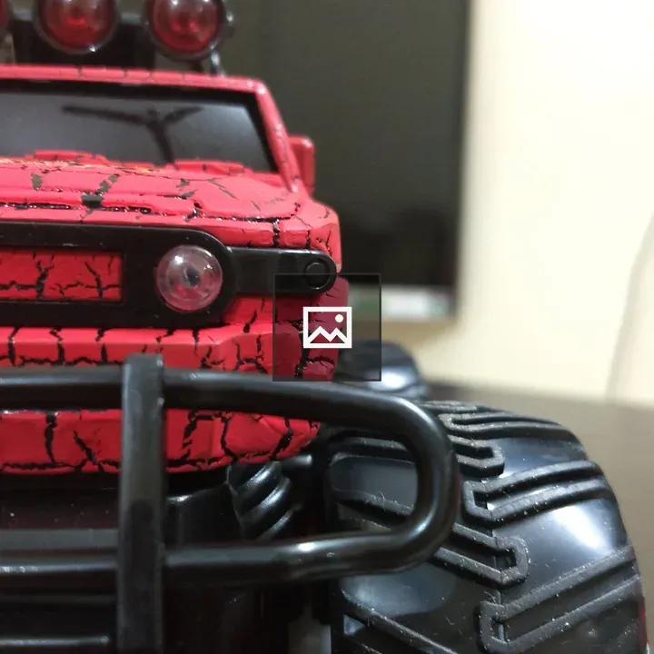 Red toy monster truck close-up