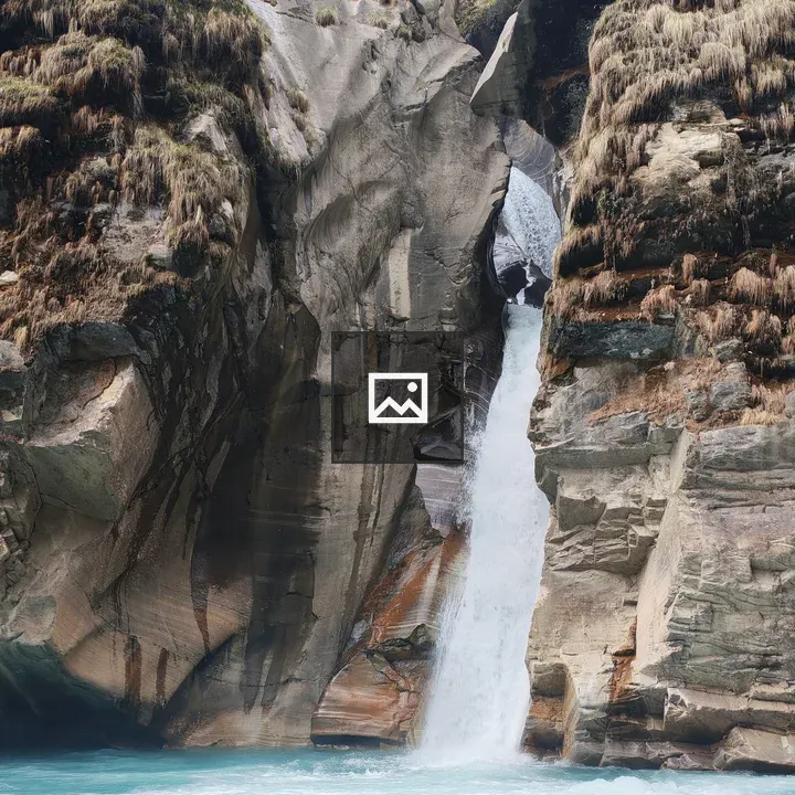 Waterfall through Narrow Rock Formation