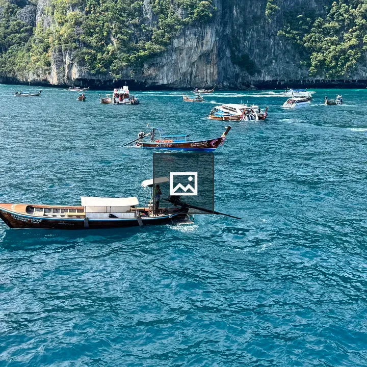 Jagged limestone cliffs by turquoise sea