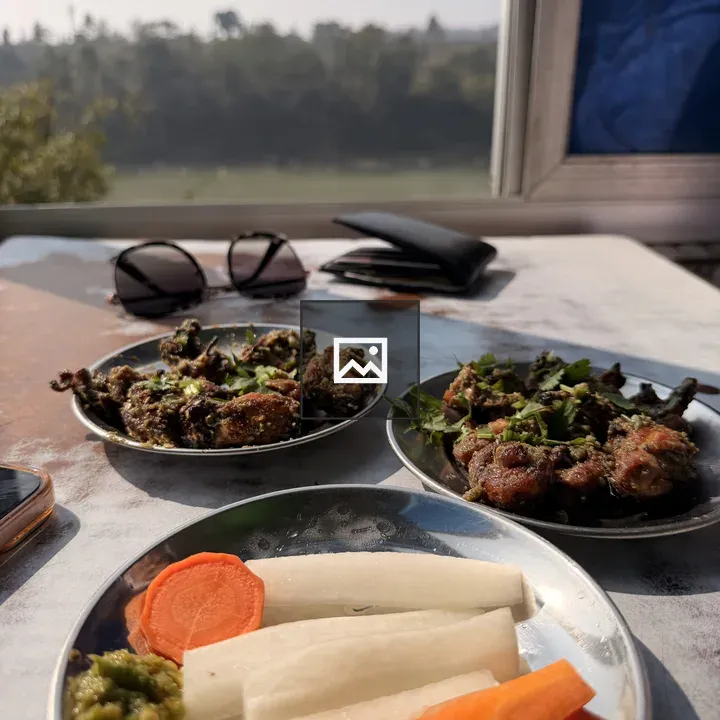 Two Plates with Vegetables and Meat