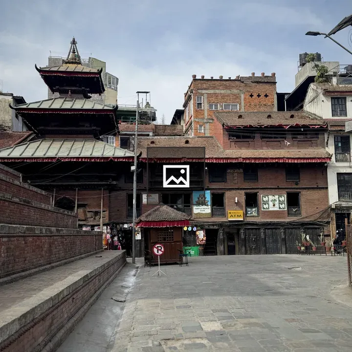 Narrow Street with Traditional and Modern Buildings