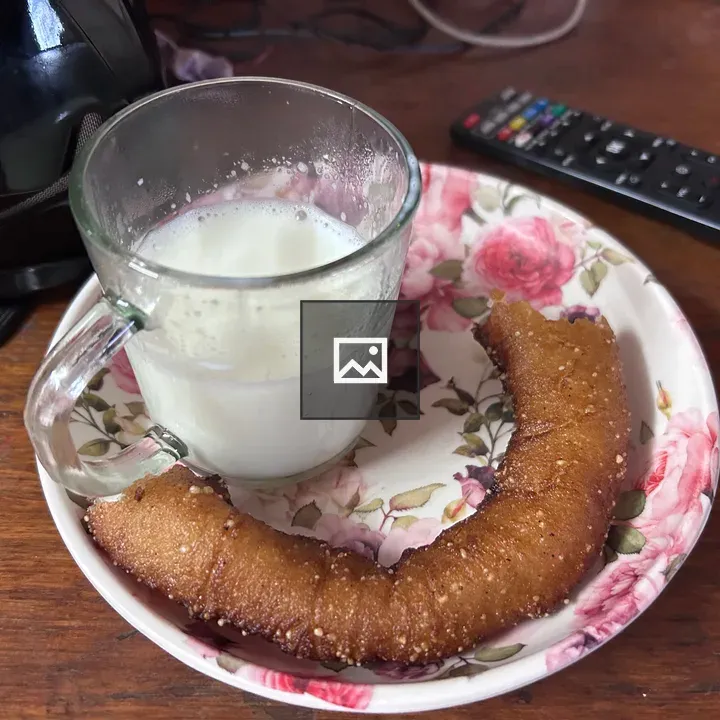Milk and Selroti in a Dish